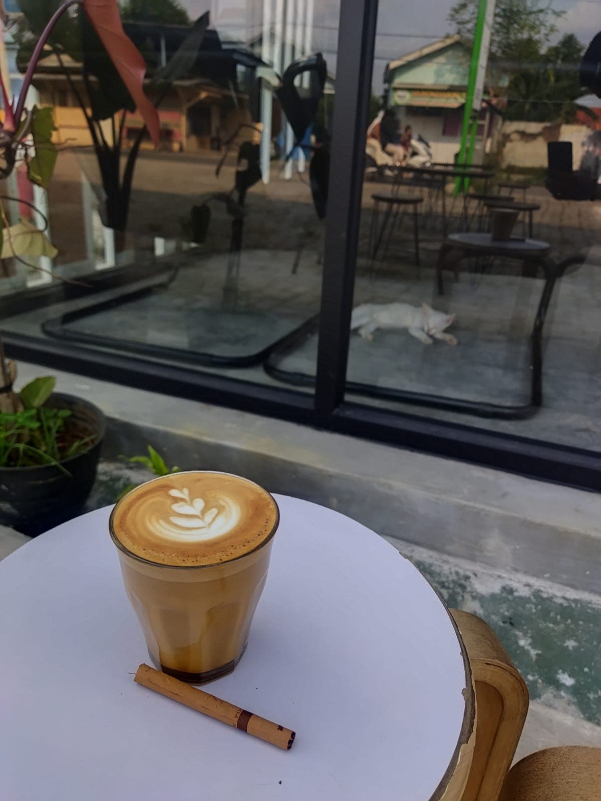 Barista pouring latte art